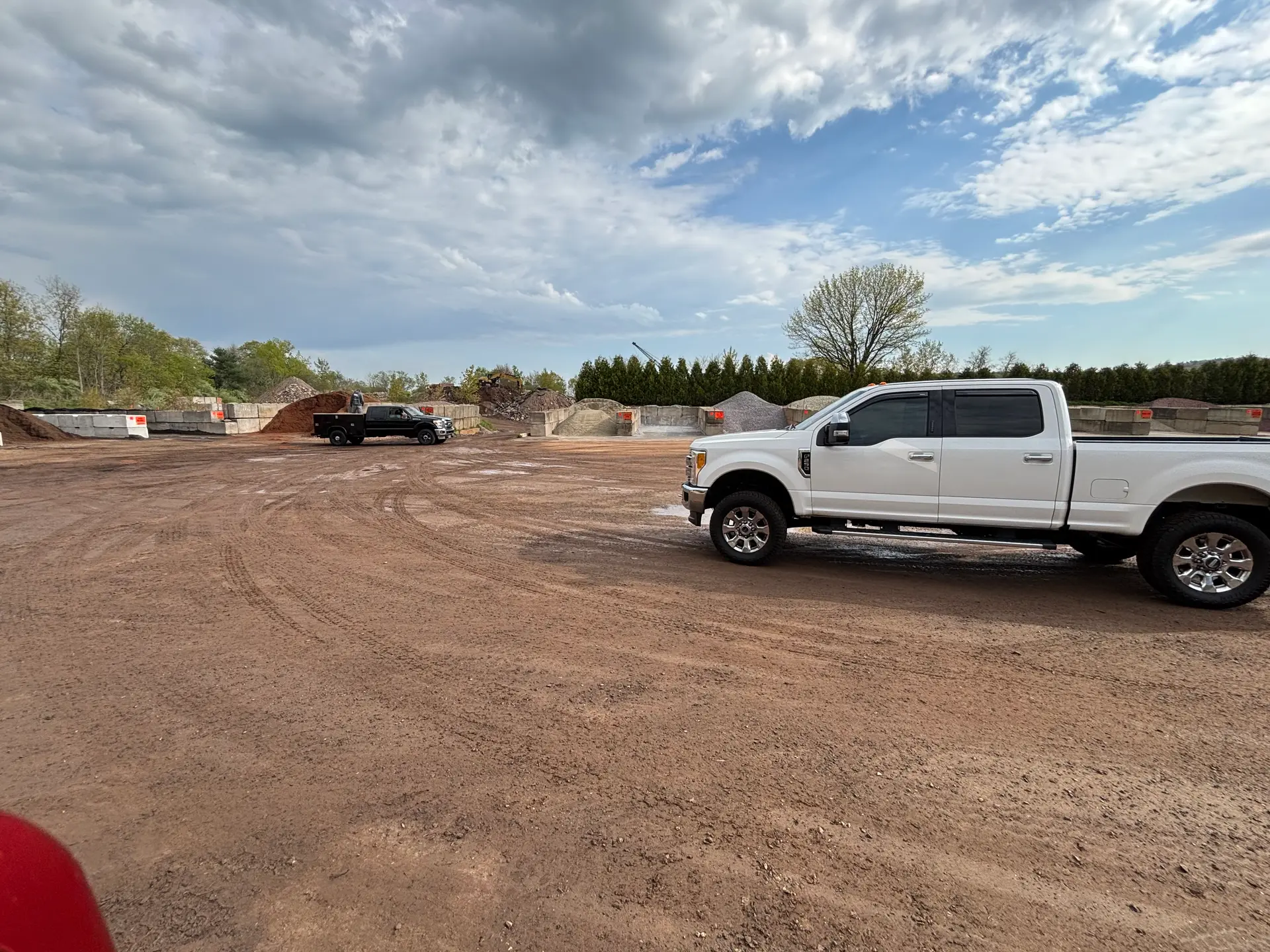 Loading bulk mulch and stone for landscape installation projects