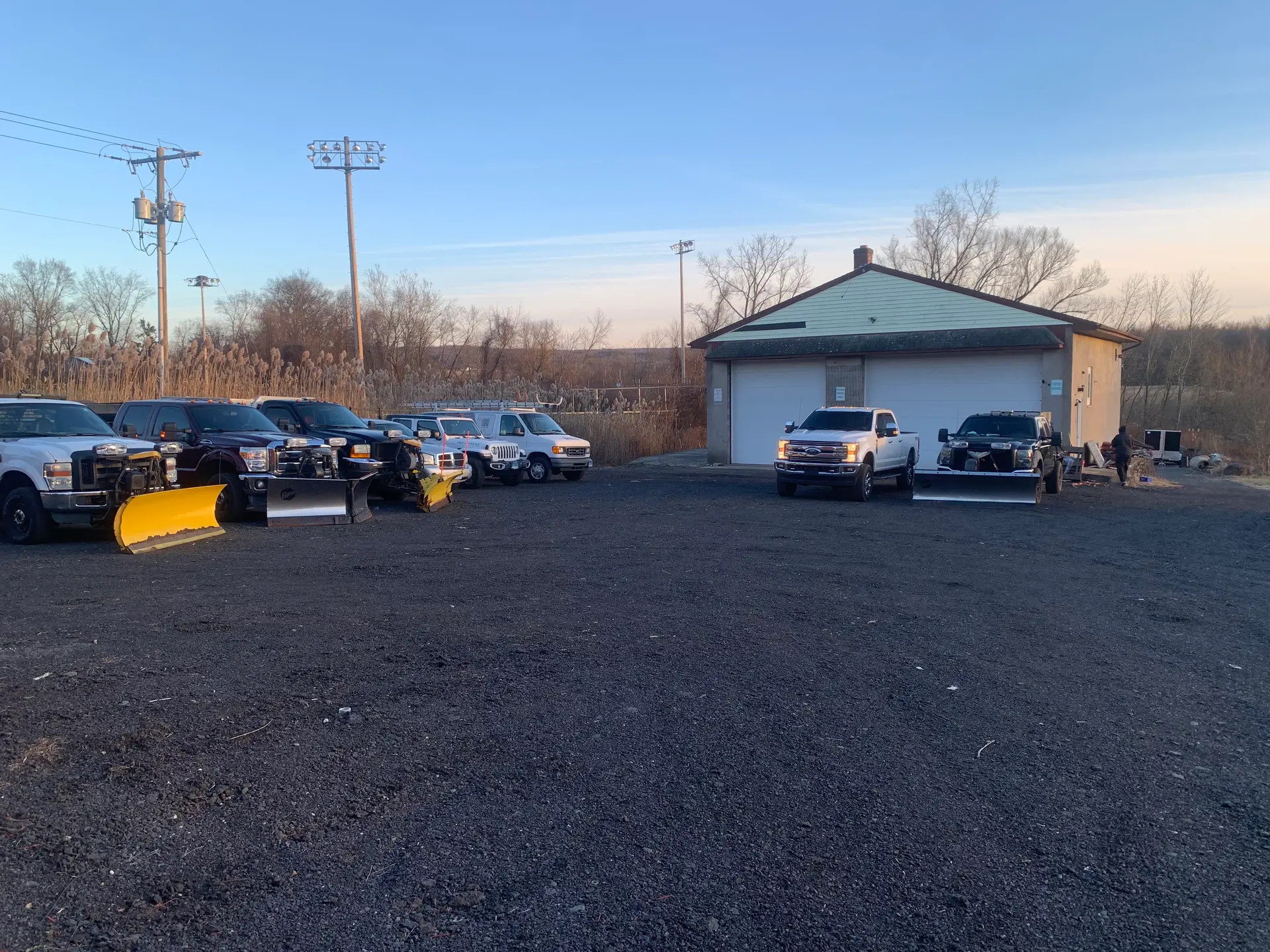 Commercial snow removal plow truck fleet ready for winter in central Connecticut